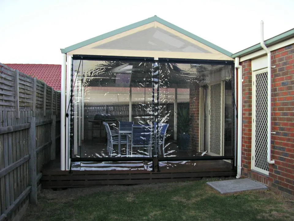 Enclosed gable pergola on a timber deck